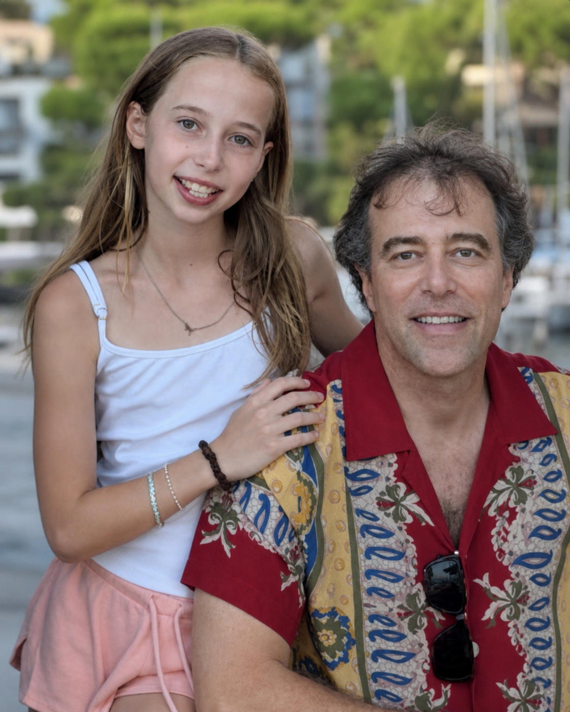 Iris with her dad, Adam, smiling together